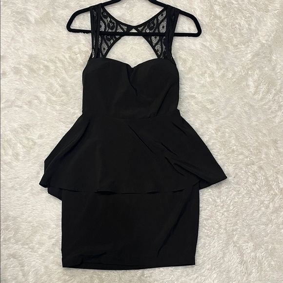 Chic Black Peplum Mini Dress - Picture 1 of 5